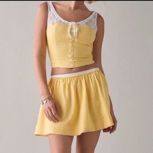 🟤NWT KIMCHI BLUE Veronica Corset Top + Mini
Skirt Set in Yellow/White